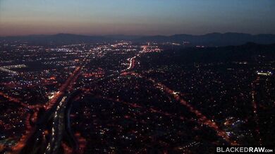 Horny Ashley Lane enjoys an intense interracial tag-team with two giant cocks