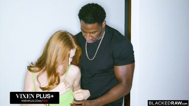 Total satisfaction for a BBC-craving redhead as she takes on a massive black dick