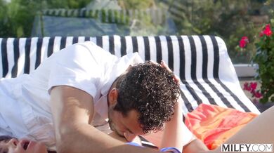 Total poolside pleasure as a curvy MILF dominates her partner in the cowgirl position